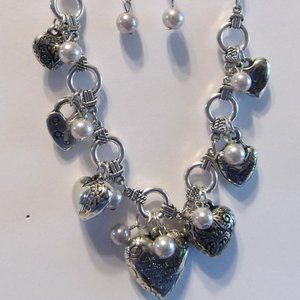 5 older Paparazzi pieces of silver and mixed metal necklace and earring sets